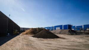 huge piles of sand and cement in production. industrial enterprise